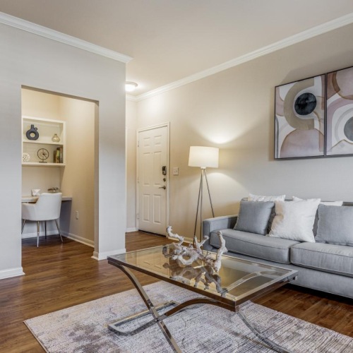 a living room with a couch and a coffee table